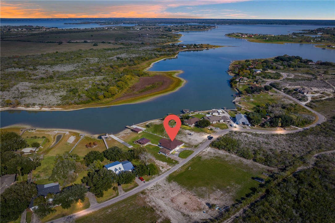 529 County Road 372 Sandia, TX 78383 - Photo 1 of 40 a view of a lake with a mountain