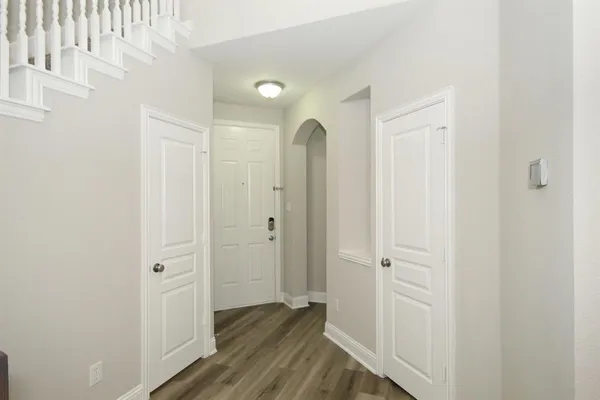 a view of a bathroom with wooden floor
