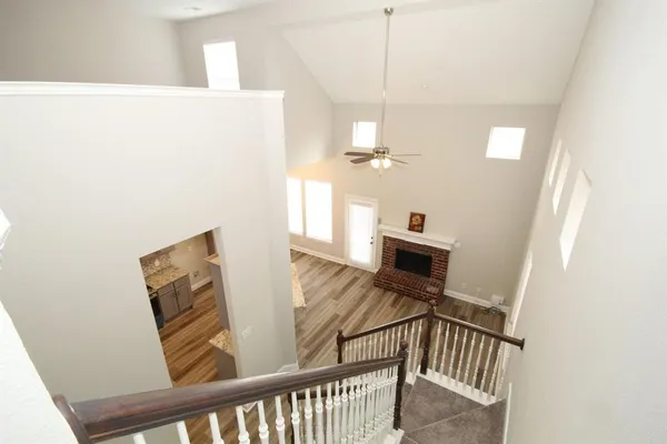 a view of a hallway with seating area