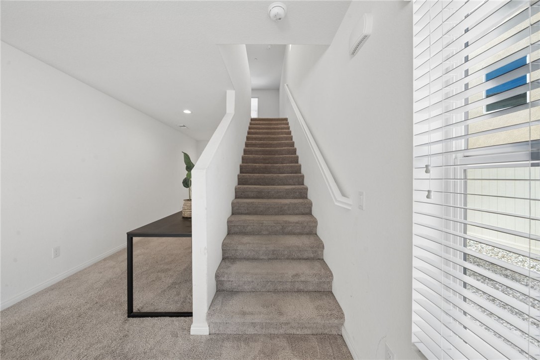 20130 Curaco Court Riverside, CA 92507 - Photo 21 of 43 Carpeted staircase leading to the second floor.