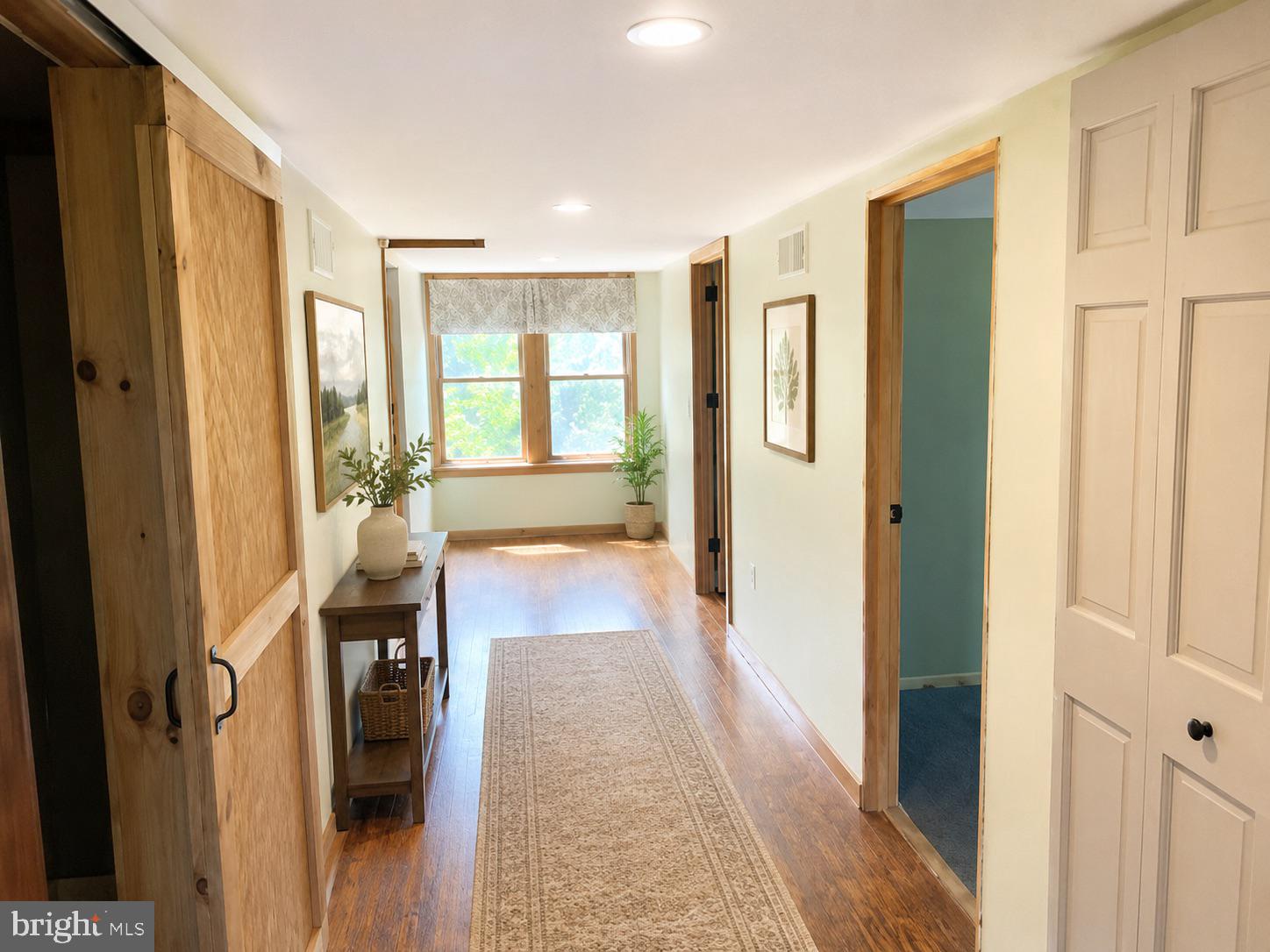 180 South Pleasantview Road Pottstown, PA 19464 - Photo 24 of 46 Inviting hallway with natural light.