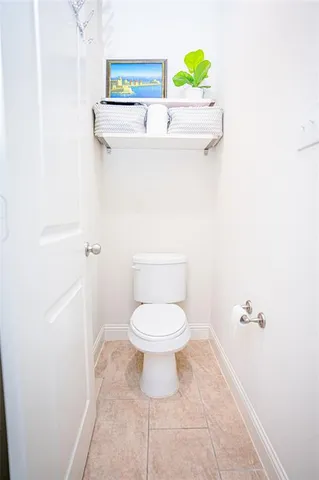 a spacious bathroom with a tub sink and mirror