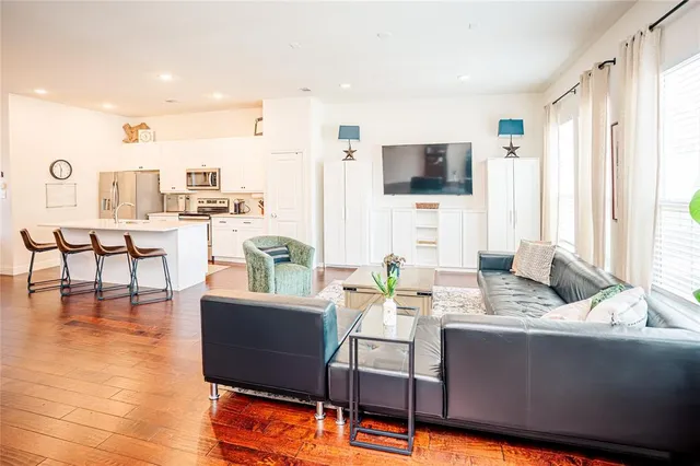 a view of a kitchen and dining room