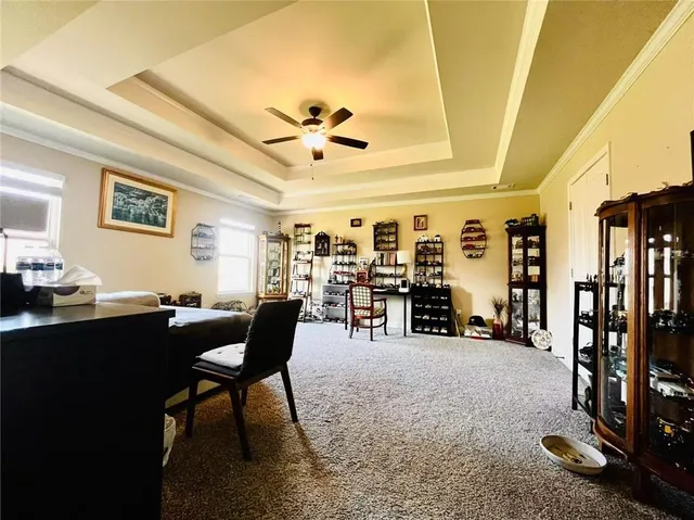 a view of a livingroom with furniture and a window