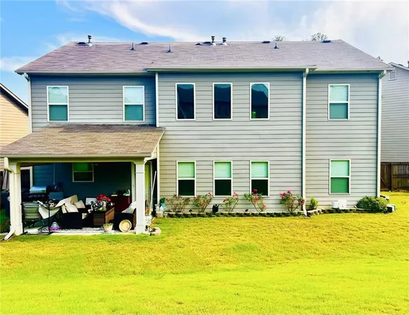 a view of a swimming pool with chairs