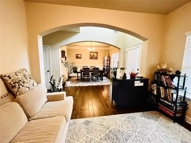 a living room with a couch and a table