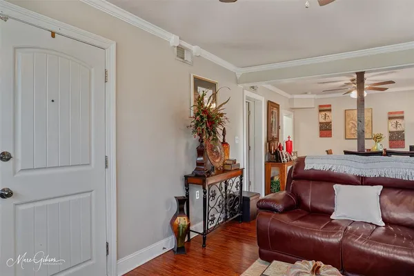 a kitchen with stainless steel appliances granite countertop a stove sink microwave and refrigerator