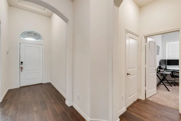 a view of a livingroom from a hallway