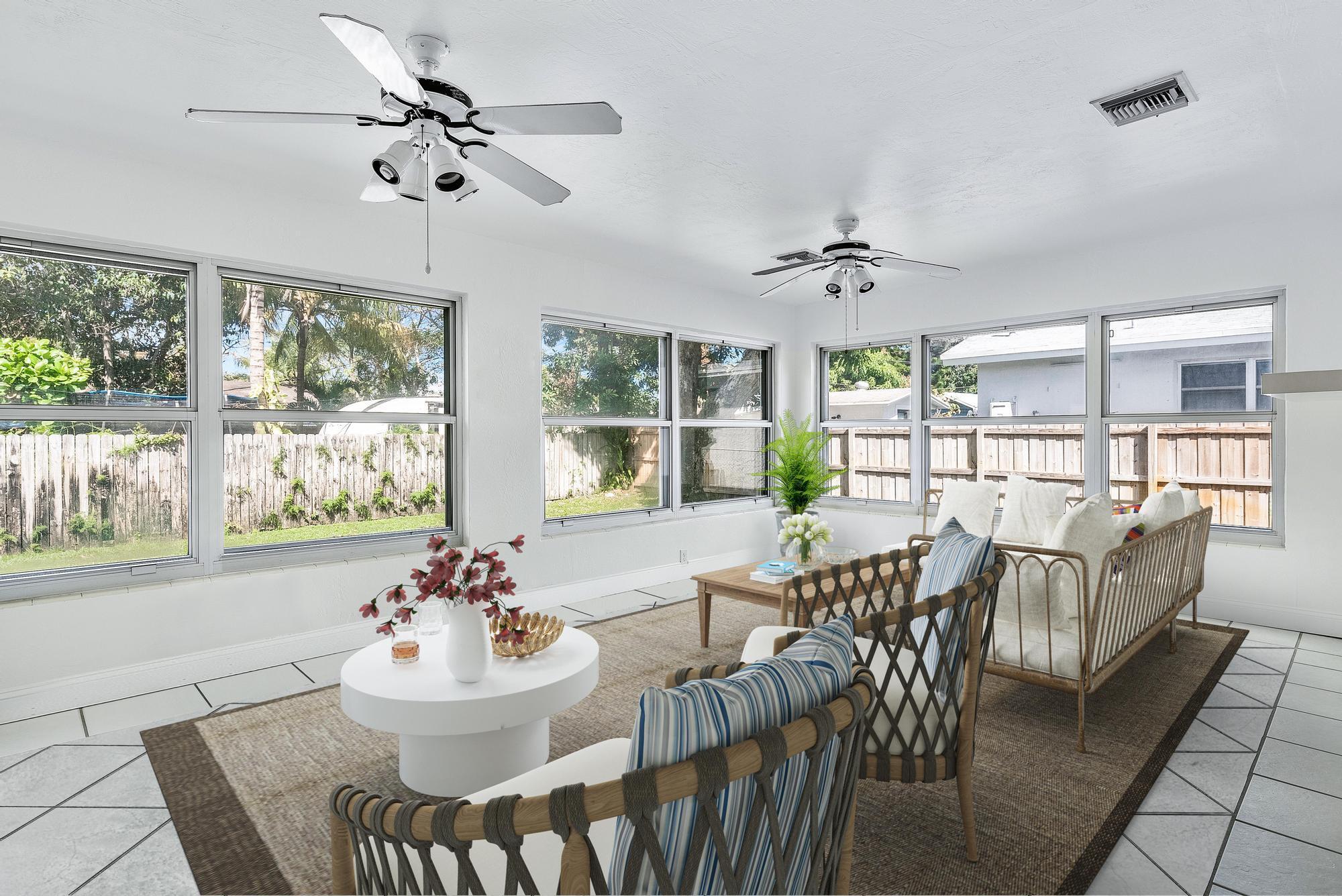 445 Monroe Drive West Palm Beach, FL 33405 - Photo 5 of 20 a view of a dining room with furniture window and outside view