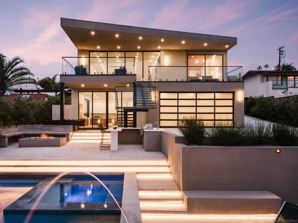 a view of a patio with swimming pool table and chairs