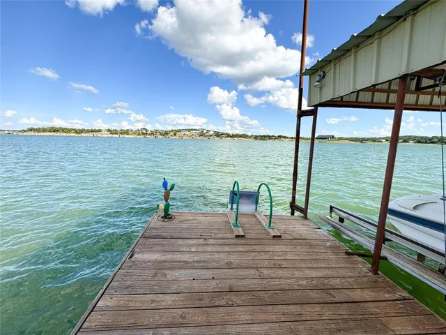 a view of a terrace with lake view and mountain view
