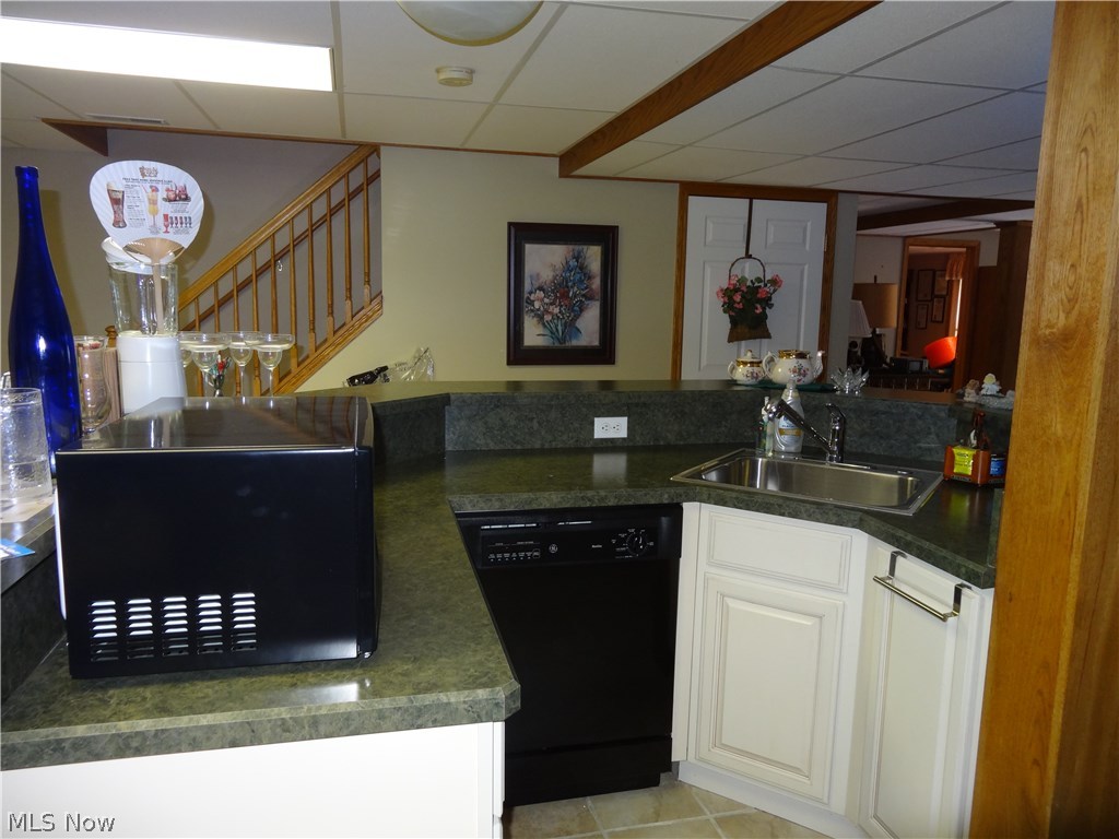 126 Chimney Ridge Chardon, OH 44024 - Photo 18 of 34 Lower level bar & kitchenette