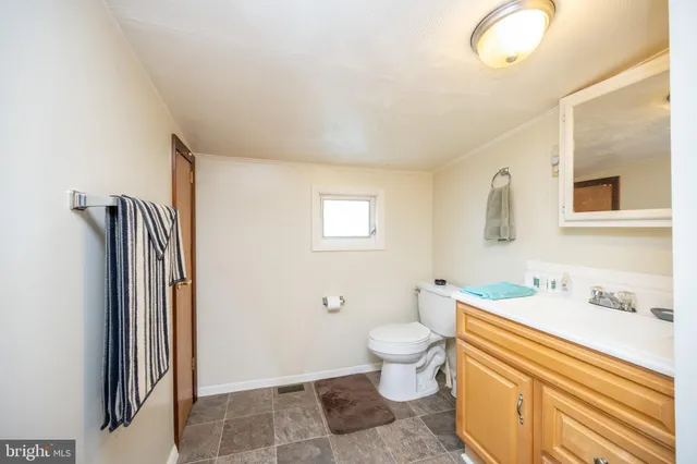 a view of front door with yard