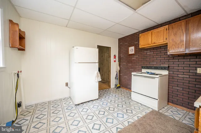 a view of hallway with livingroom