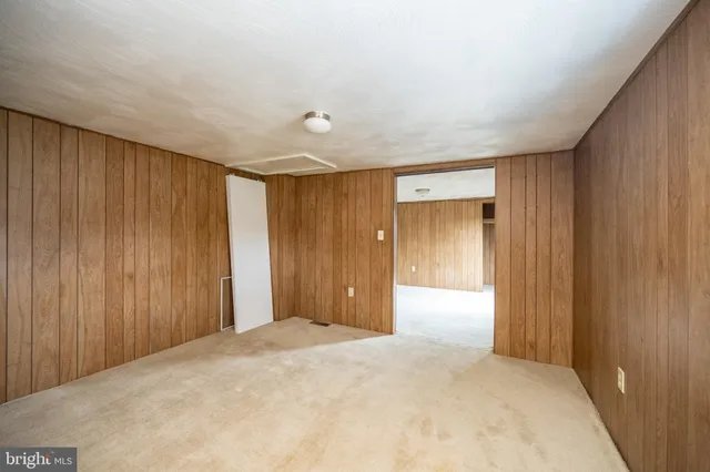 a bathroom with a bathtub and a toilet