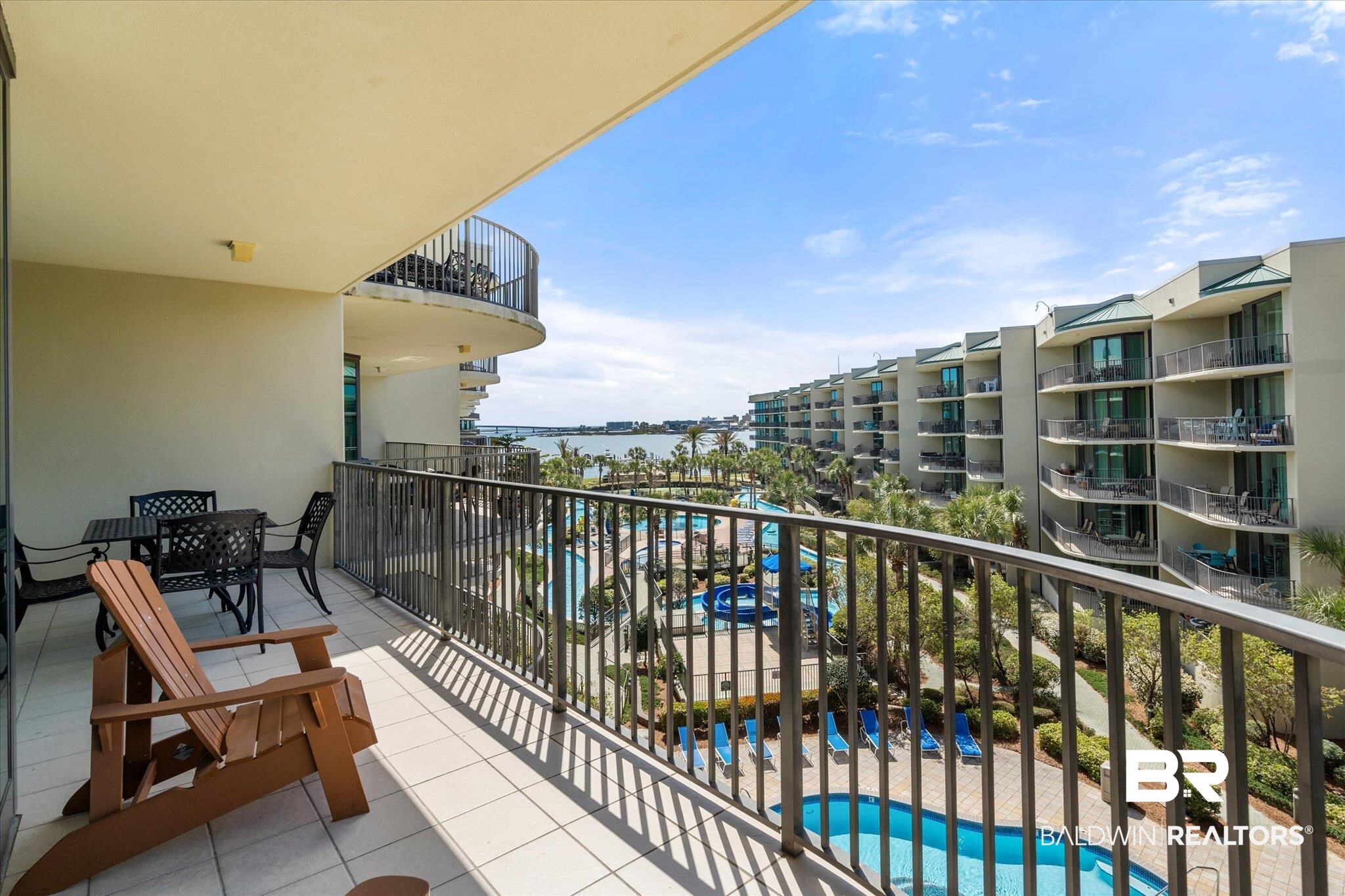27580 Canal Road, Unit 1423 Orange Beach, AL 36561 - Photo 17 of 34 Balcony with water and courtyard view.