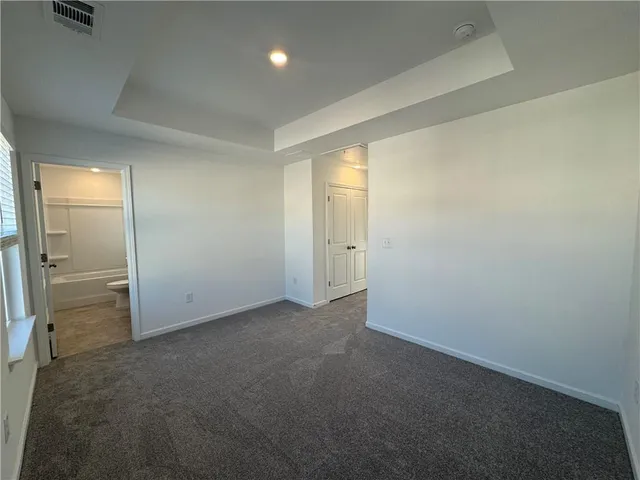 an empty room with an entryway