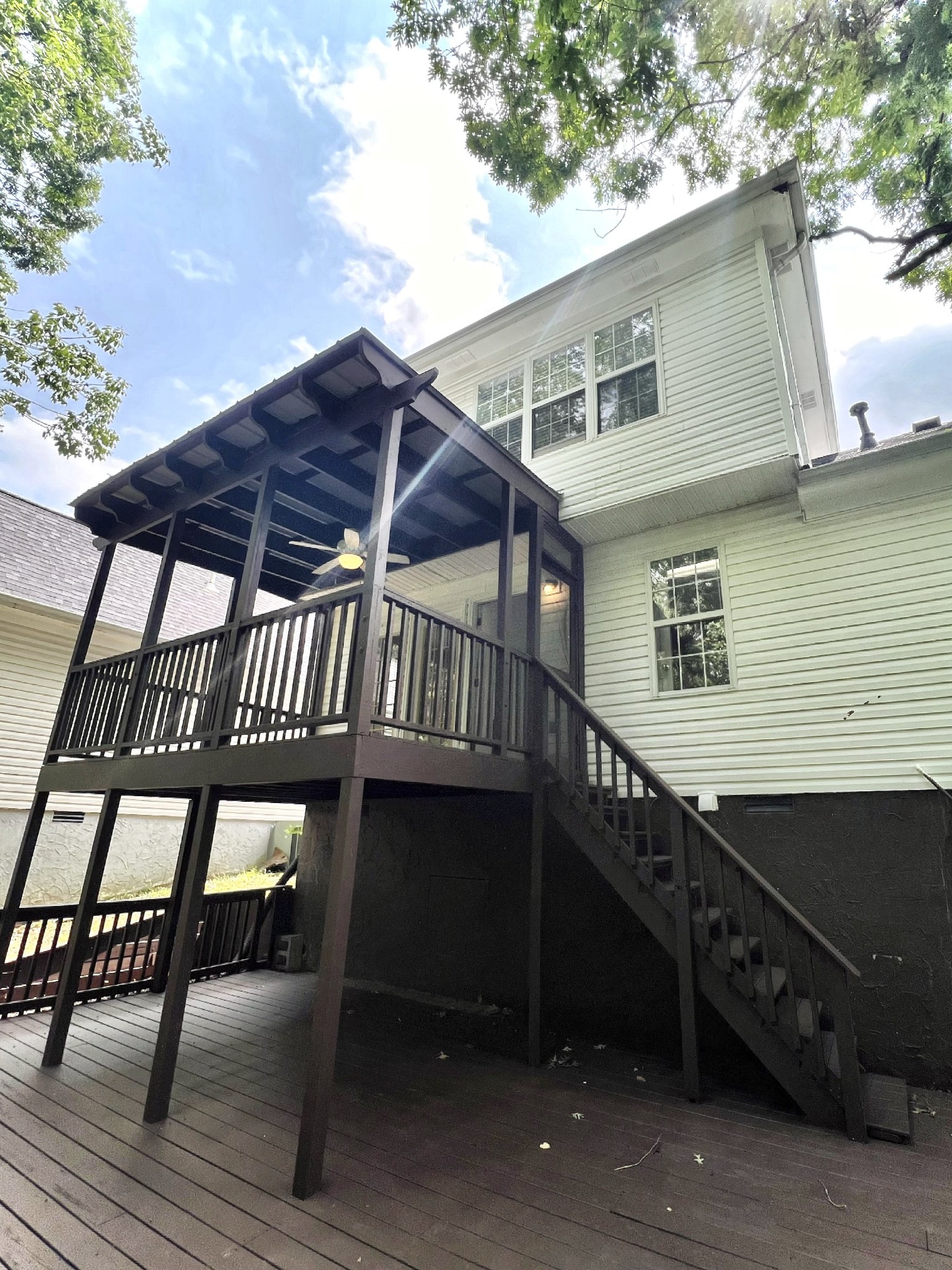 2817 Rader Ridge Court Antioch, TN 37013 - Photo 14 of 14 a view of a house with wooden deck and furniture