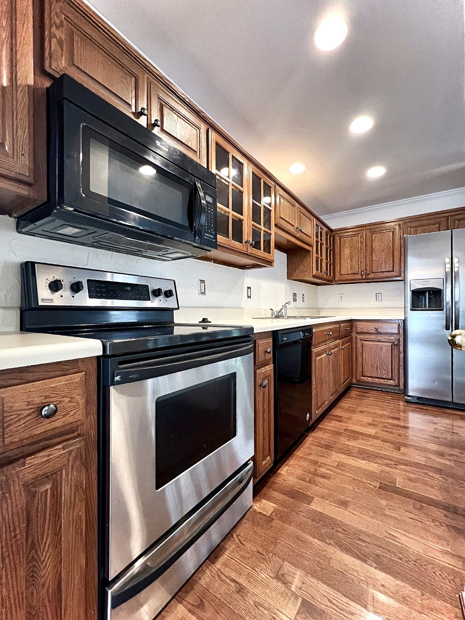 2817 Rader Ridge Court Antioch, TN 37013 - Photo 3 of 14 a kitchen with stainless steel appliances granite countertop a stove and a sink