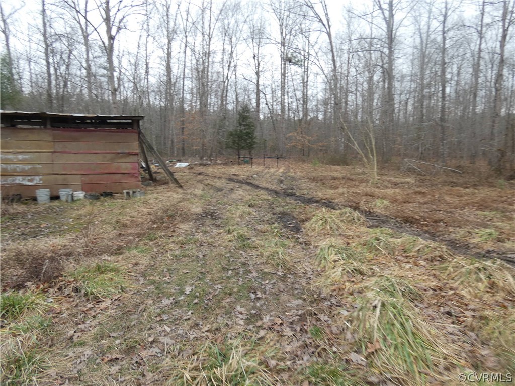 10309 Taylor Road Chesterfield, VA 23838 - Photo 10 of 16 a view of a yard with wooden fence