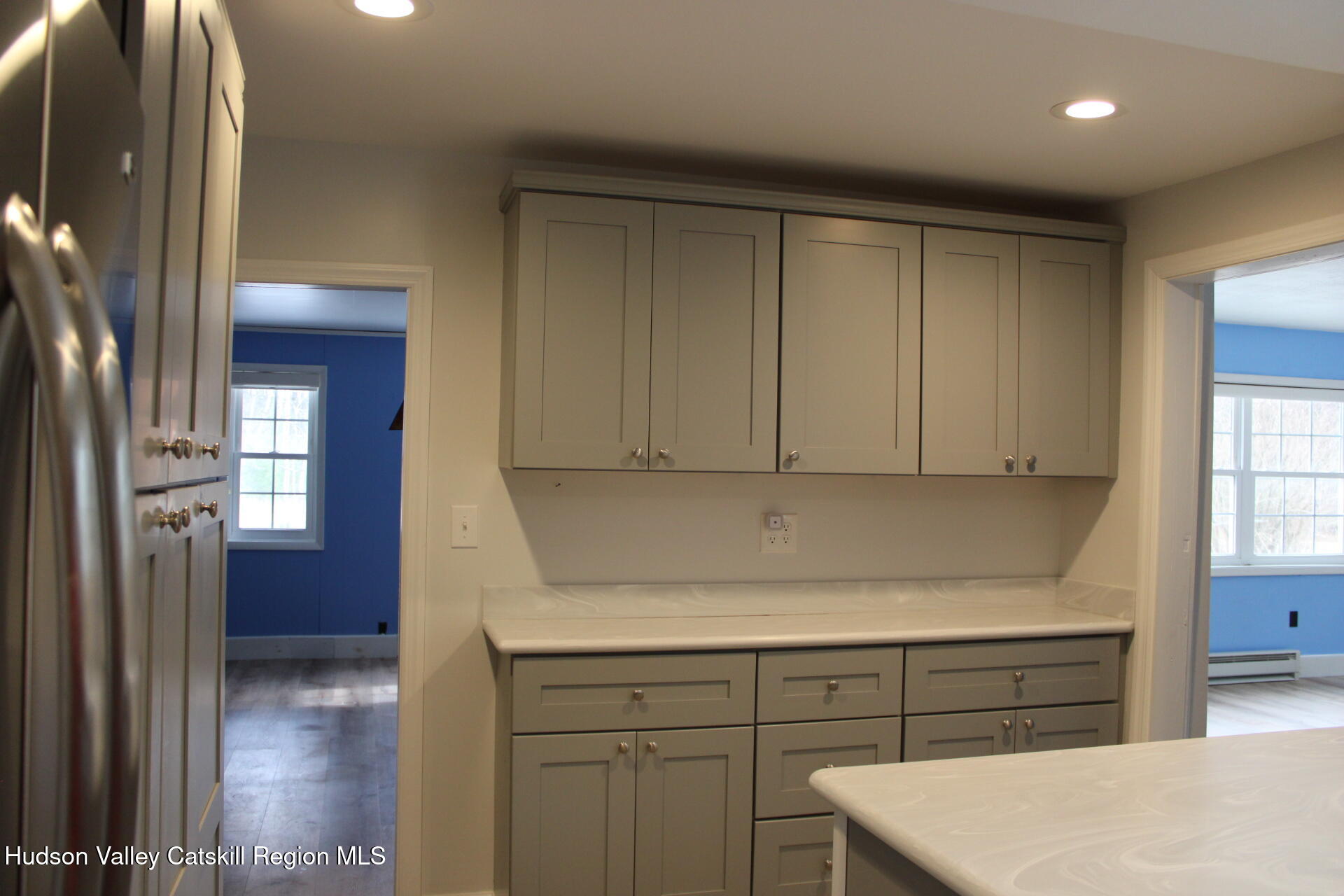 477 Campbell Road Windham, NY 12496 - Photo 18 of 45 a kitchen with a white cabinets and a refrigerator