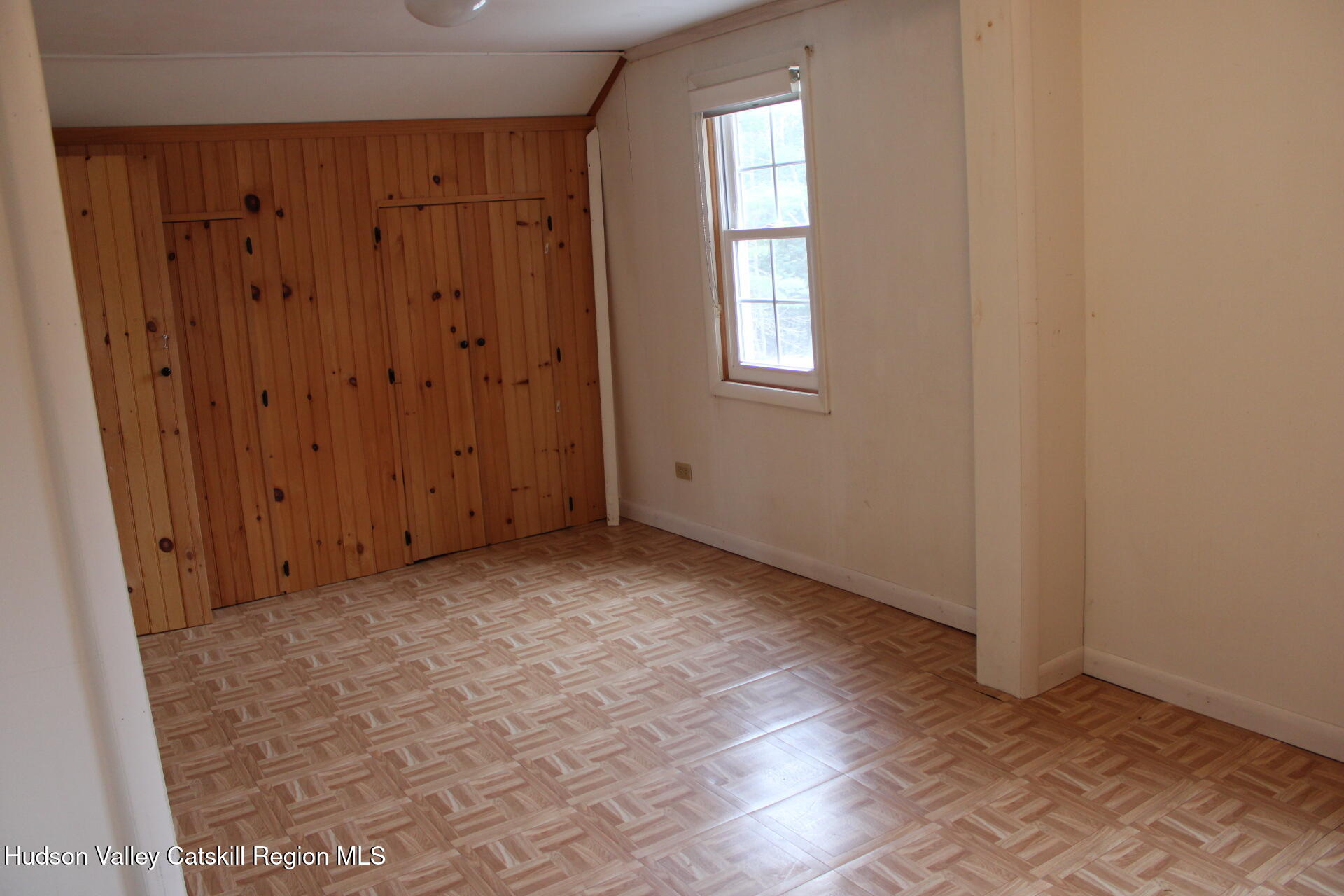 477 Campbell Road Windham, NY 12496 - Photo 30 of 45 an empty room with windows