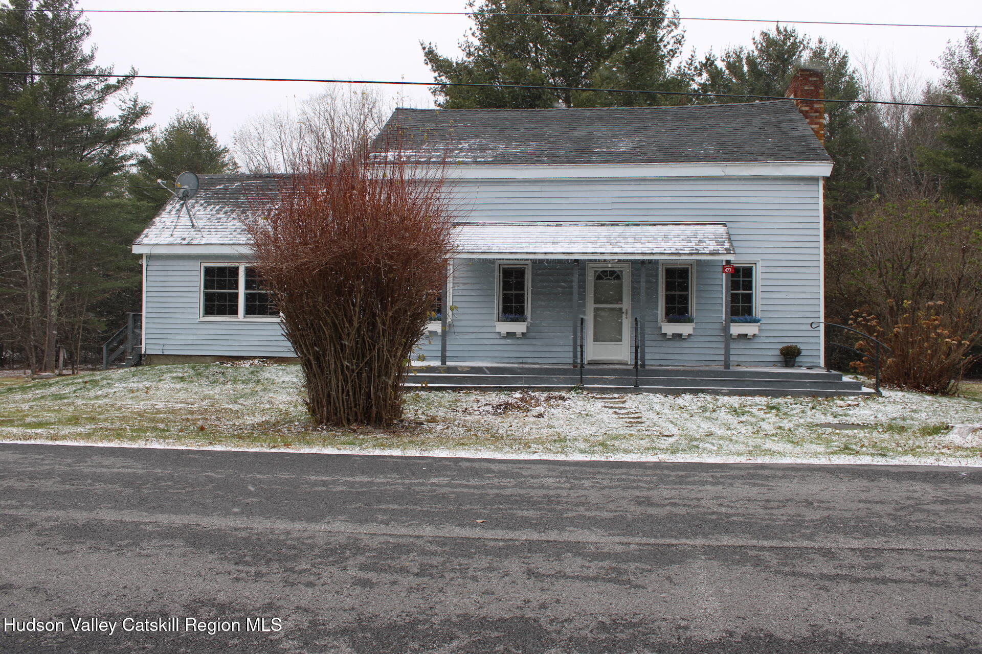 477 Campbell Road Windham, NY 12496 - Photo 35 of 45 front view of a house with a yard