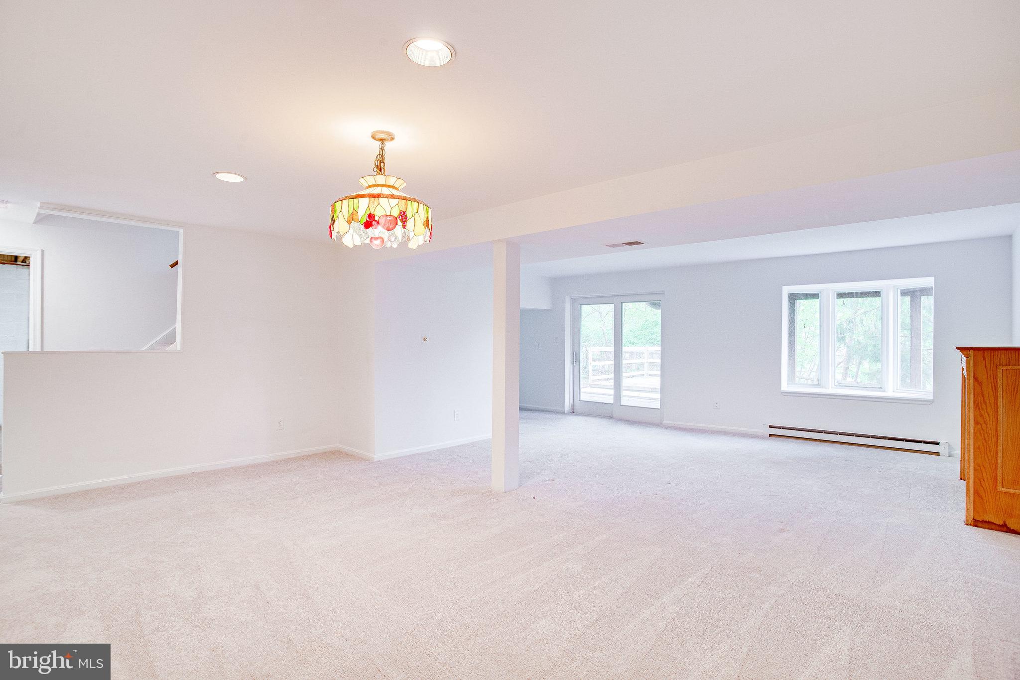 12220 St James Road Potomac, MD 20854 - Photo 46 of 69 Lower-level bright walkout rec room