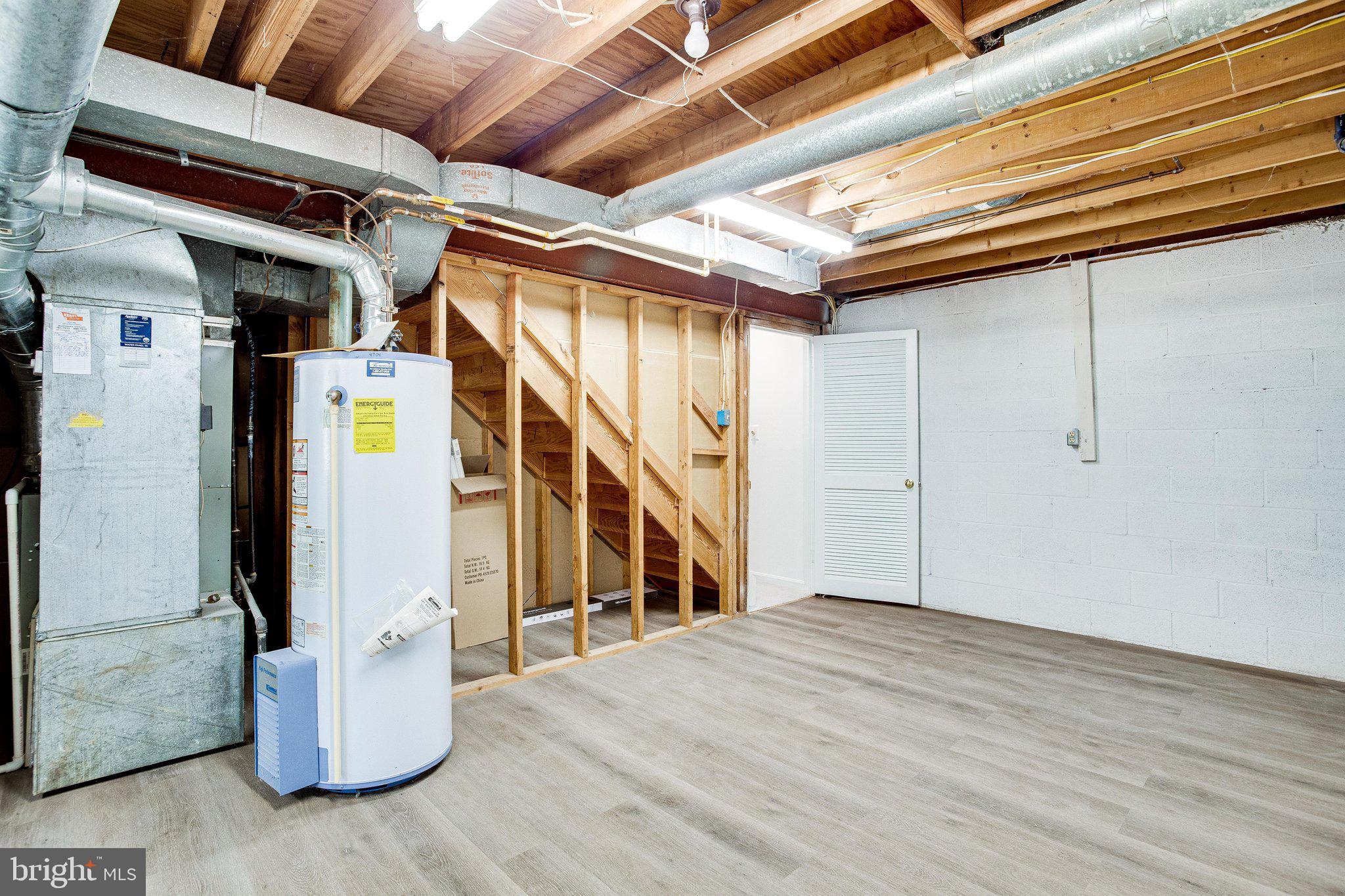 12220 St James Road Potomac, MD 20854 - Photo 51 of 69 Lower-level bonus room/storage room with new floor