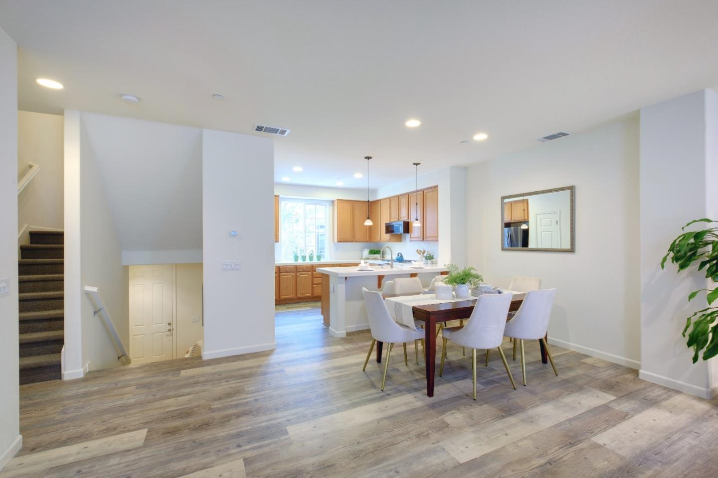 738 Claridad Loop Milpitas, CA 95035 - Photo 11 of 53 a dining room with furniture and window