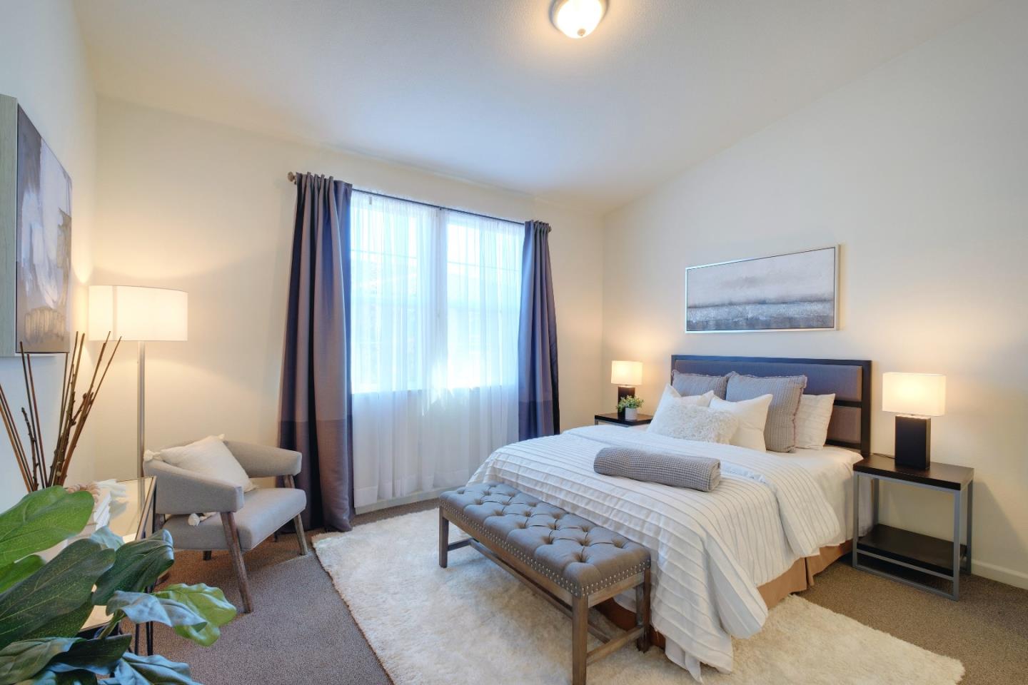 738 Claridad Loop Milpitas, CA 95035 - Photo 21 of 53 a bedroom with a bed couch and a window