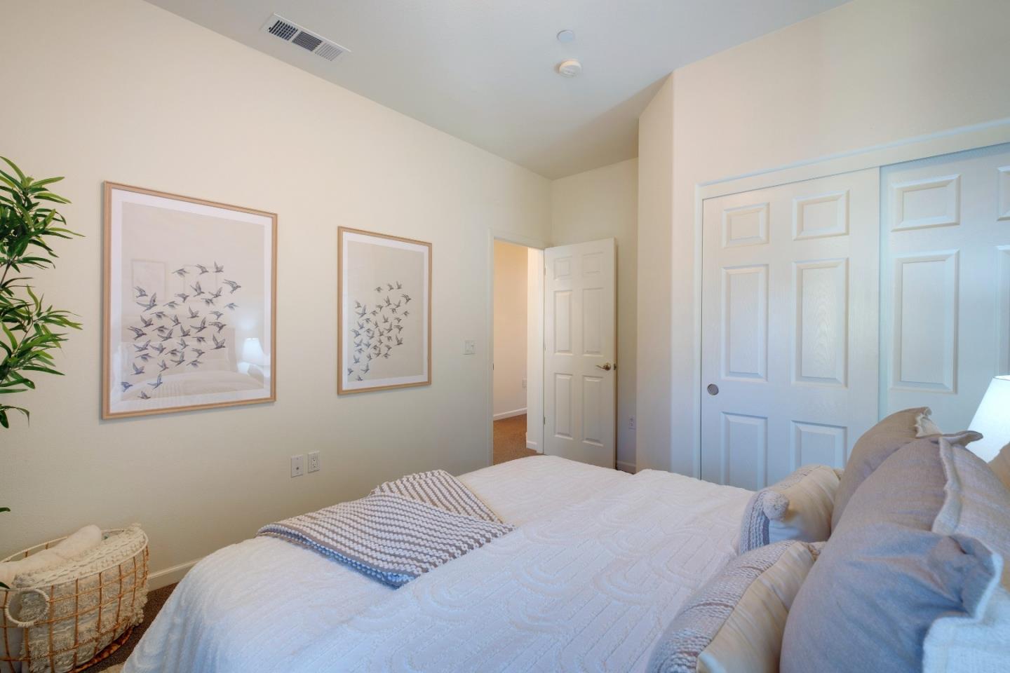 738 Claridad Loop Milpitas, CA 95035 - Photo 30 of 53 a bedroom with a bed and the couch