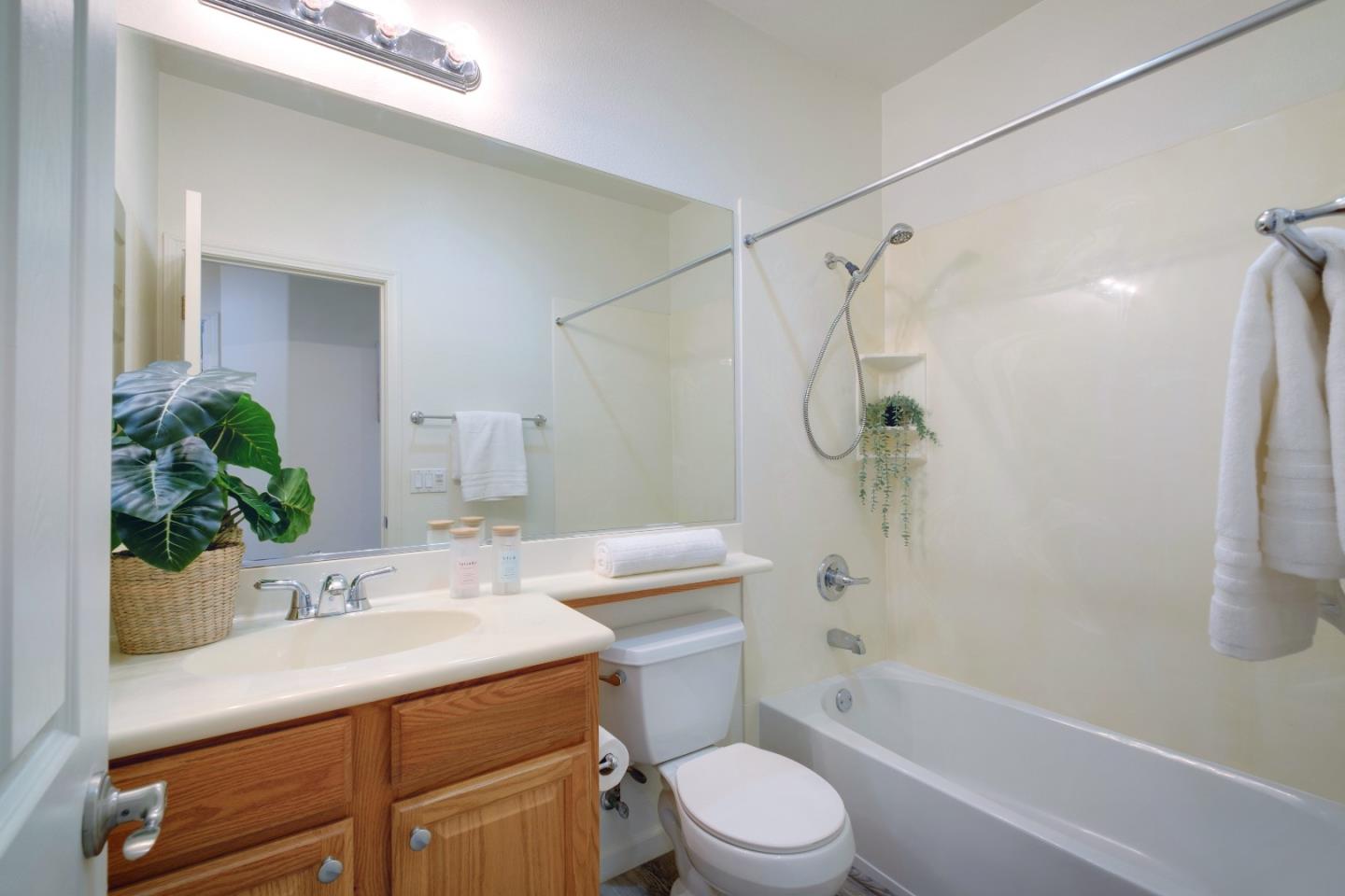738 Claridad Loop Milpitas, CA 95035 - Photo 32 of 53 a bathroom with a sink a toilet and shower