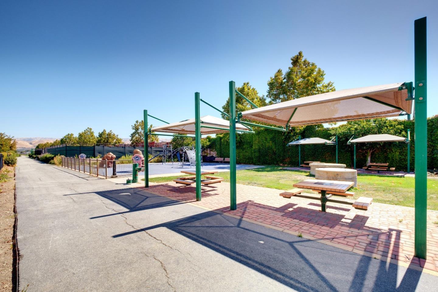 738 Claridad Loop Milpitas, CA 95035 - Photo 46 of 53 a view of a swimming pool with a patio