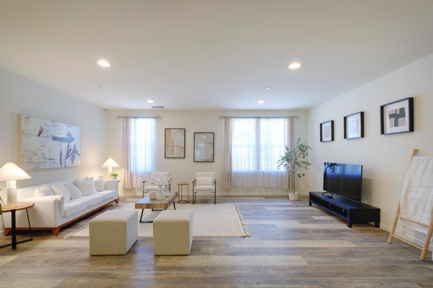 738 Claridad Loop Milpitas, CA 95035 - Photo 5 of 53 a living room with furniture and a flat screen tv