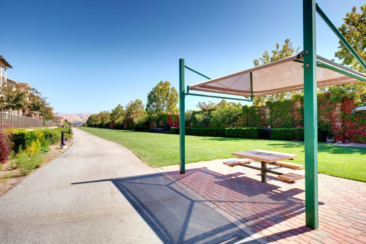 738 Claridad Loop Milpitas, CA 95035 - Photo 51 of 53 a view of a road with a big yard