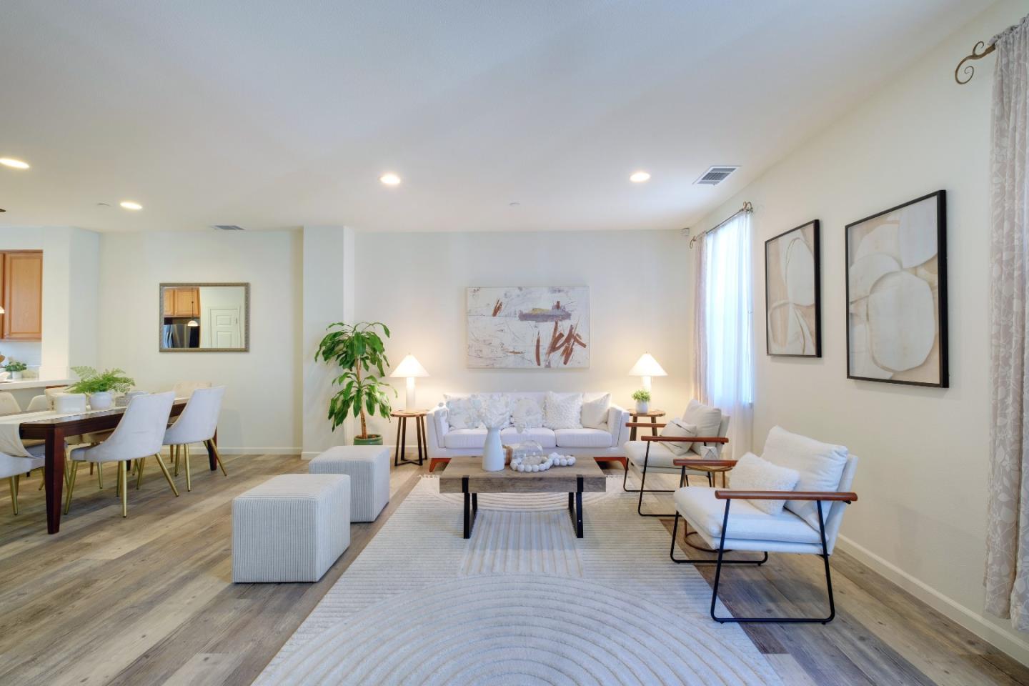 738 Claridad Loop Milpitas, CA 95035 - Photo 8 of 53 a living room with furniture and a wooden floor