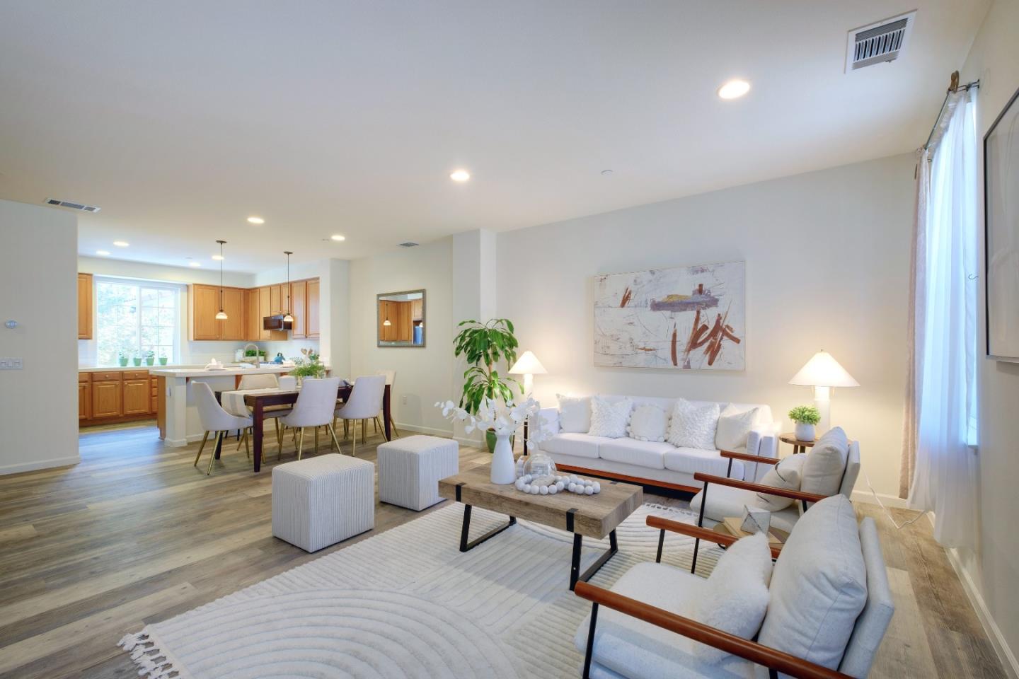 738 Claridad Loop Milpitas, CA 95035 - Photo 10 of 53 a living room with furniture and a wooden floor