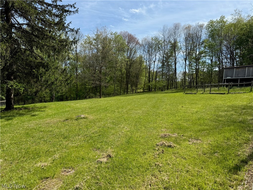11811 Gaston Road Rogers, OH 44455 - Photo 21 of 38 You've got several acres of usable space, pole barns, and a Quonset Hut (currently used for recreation). Take advantage of the room to play, and play!!
