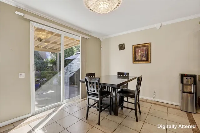 a view of a dining room with furniture large window and outside view