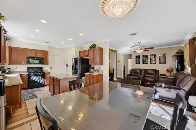 a living room with fireplace furniture and a flat screen tv