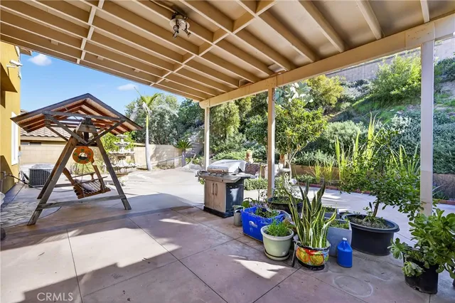 an aerial view of houses with yard