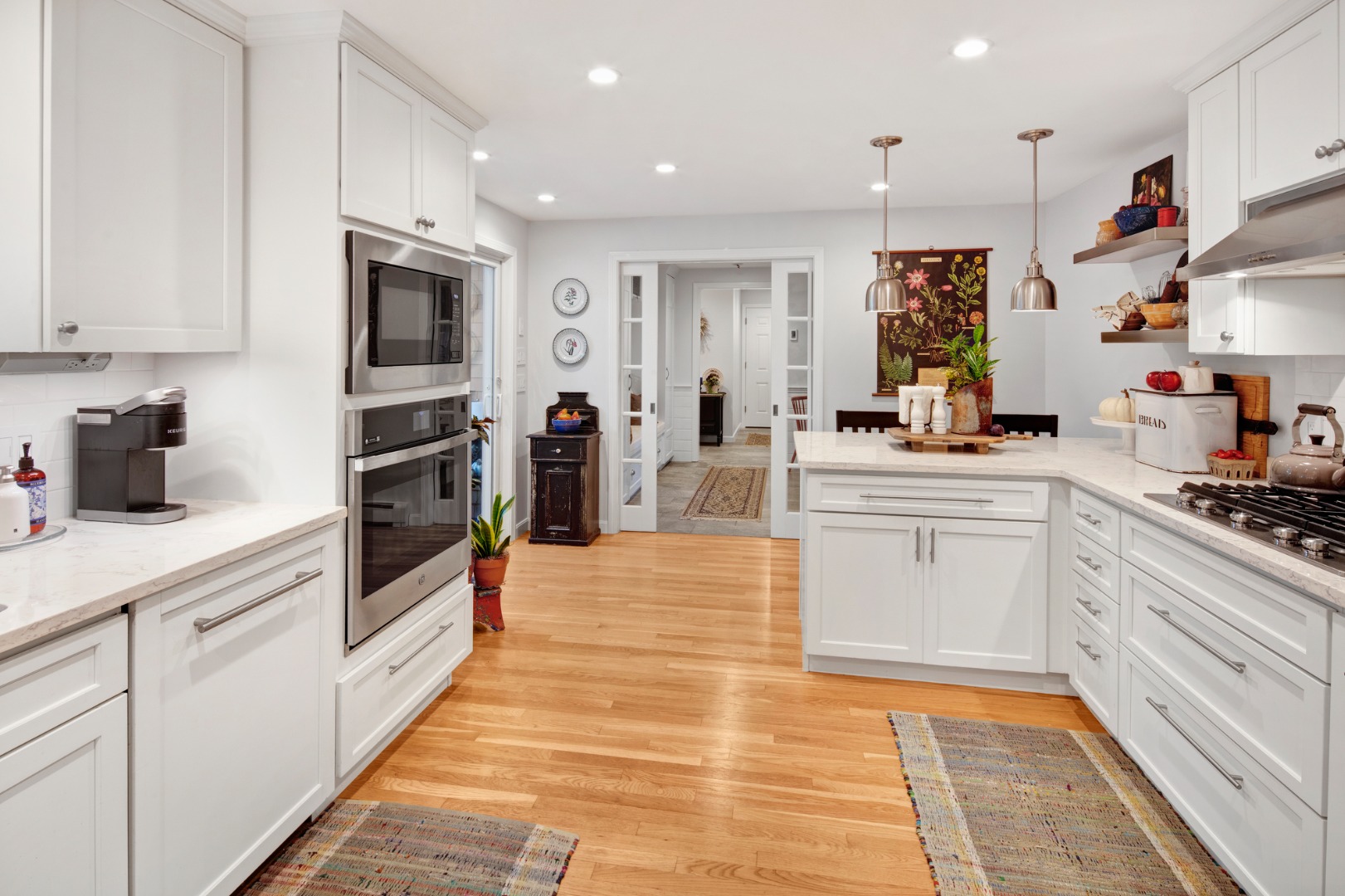 46 Bold Meadow Road Edgartown, MA 02539 - Photo 11 of 28 a kitchen with stainless steel appliances kitchen island granite countertop a sink and cabinets