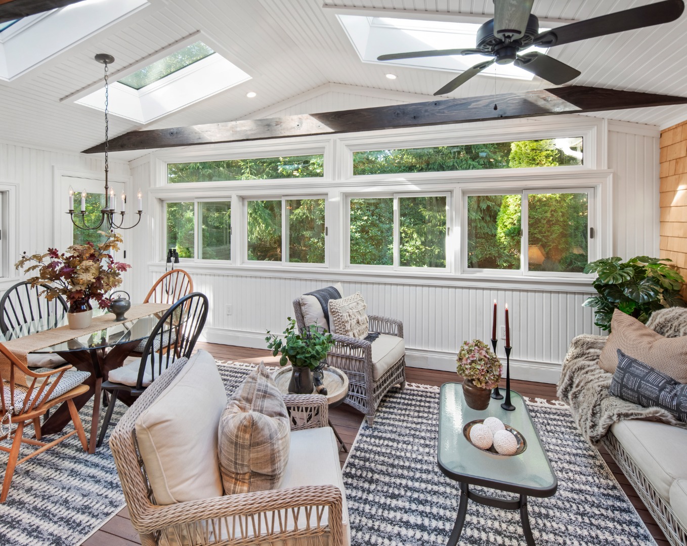 46 Bold Meadow Road Edgartown, MA 02539 - Photo 17 of 28 a view of a dining room with furniture a chandelier and large windows