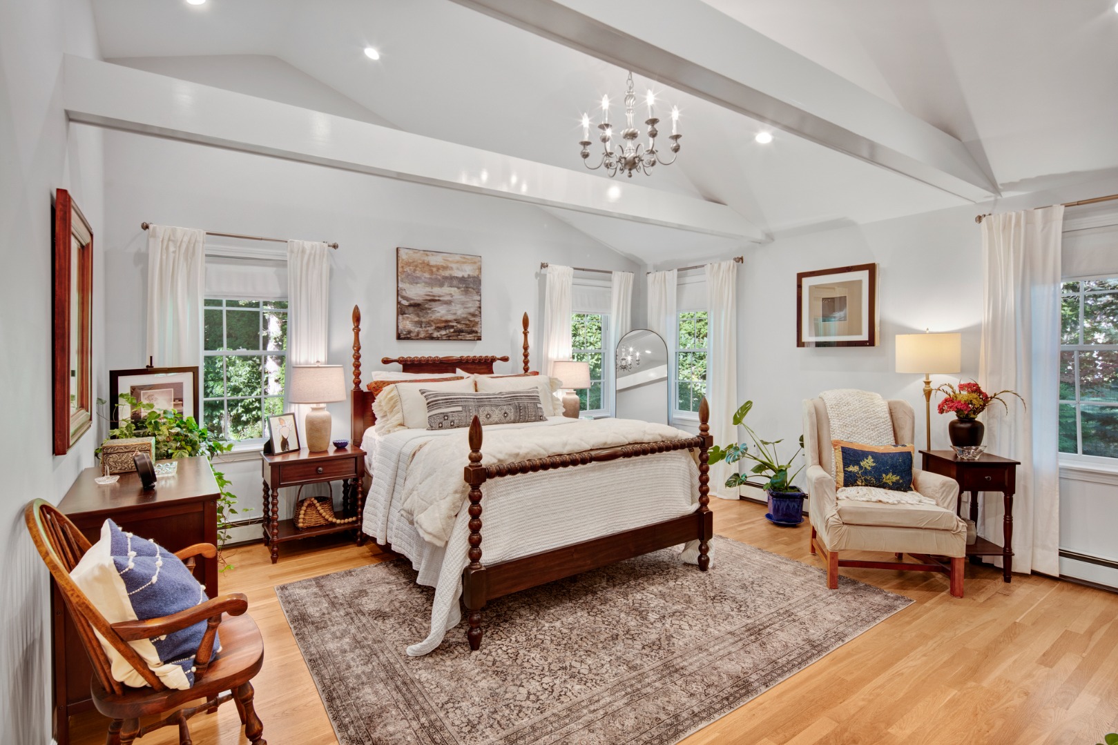 46 Bold Meadow Road Edgartown, MA 02539 - Photo 19 of 28 a bedroom with a bed and wooden floor