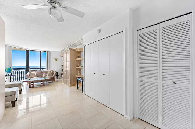 a living room with furniture and white walls