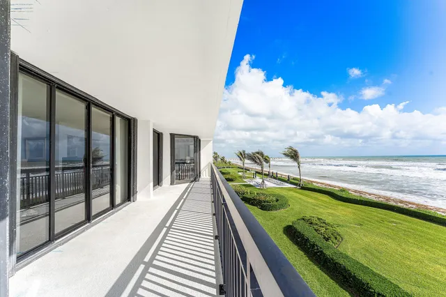 a view of swimming pool with seating area