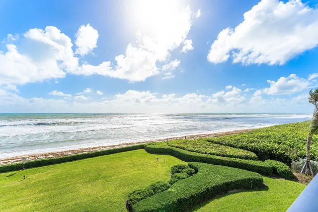 a view of an swimming pool and an outdoor seating