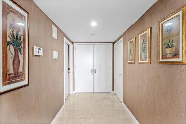 a view of a living room filled with furniture