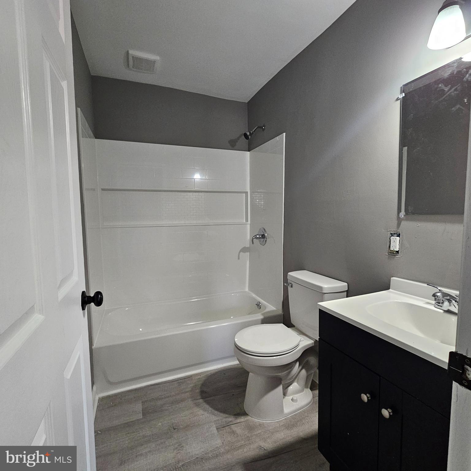 41 Churchtown Road Pennsville, NJ 08070 - Photo 7 of 16 a bathroom with a sink toilet and shower